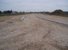 Baugebiet Gewerbegebiet II Büttelborn –  Erschließung 20 ha, Bauzustand 2008, nach Einbau der ersten Lage Frostschutzschicht, Herstellung der Rundborde und der Rinne